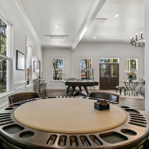 Start a marathon poker session around the table, or play pool instead