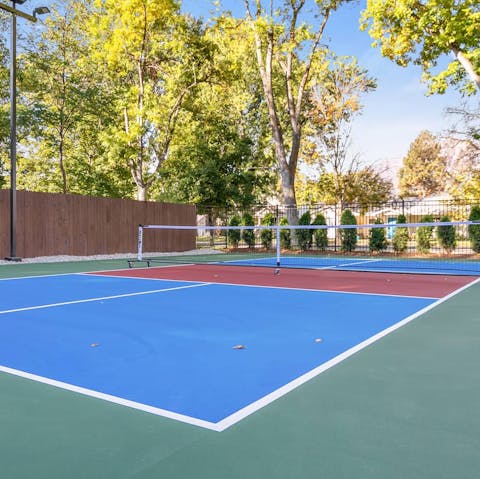 Try your hand at pickleball on the floodlit court