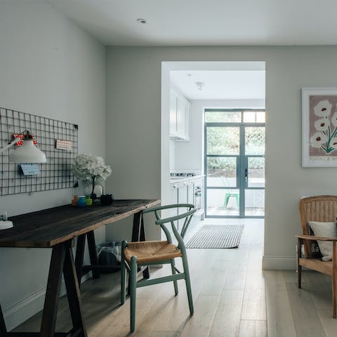 Catch up on work emails at the rustic desk