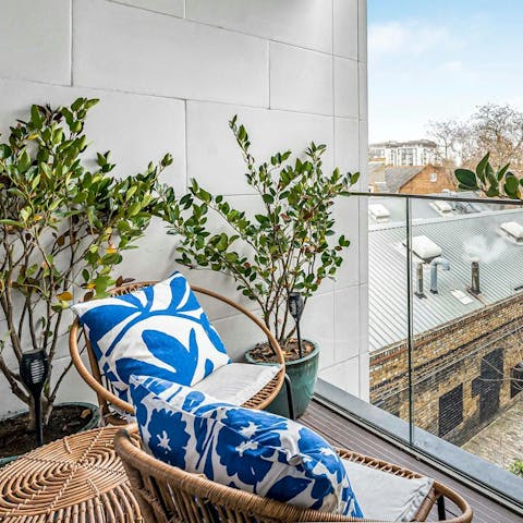 Enjoy the fresh air on the private balcony
