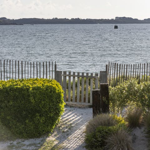 Open the gate to reach the beach