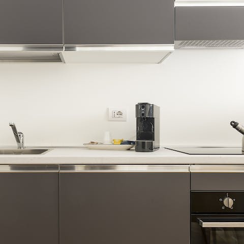 Try your hand at classic Milanese recipes in the modern grey kitchen