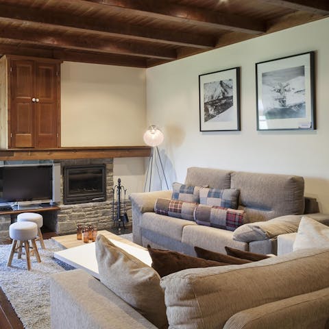 Cosy up in front of the fireplace after a busy day on the mountain