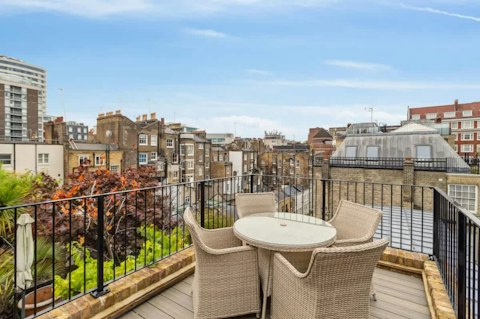 Take in classic London rooftops from the furnished terrace