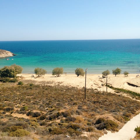 Dip your toe in at Ammoudara Beach, only a short drive away