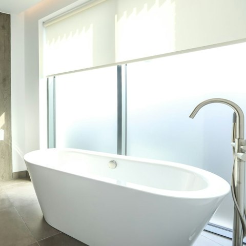 Sink into your bathtub for a restorative soak, after a day walking the city