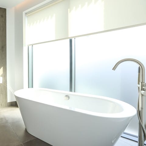 Sink into your bathtub for a restorative soak, after a day walking the city