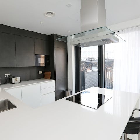 Throw open the balcony doors and prepare a culinary feast in your sleek and breezy kitchen