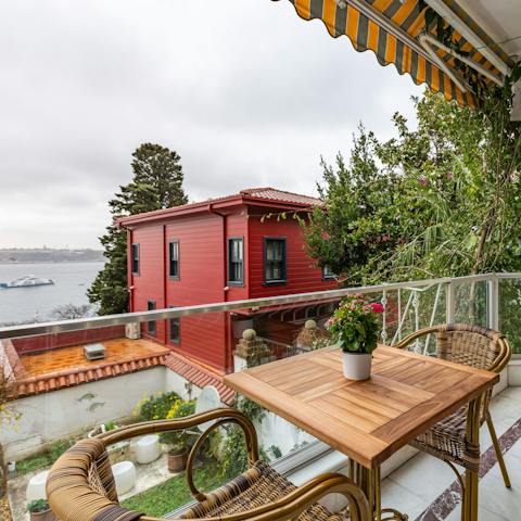 Watch the boats go by from your private balcony