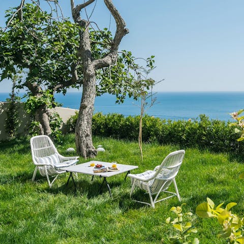 Take your breakfast outdoors for coffee with a side of breathtaking sea views