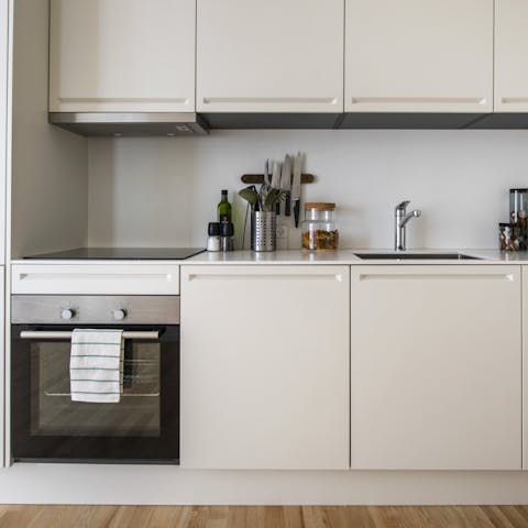 Whip up light bites like open smørrebrød sandwiches in the kitchen – it was custom-made by a local joiner