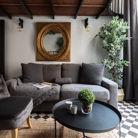 Unwind in the chic lounge area at the end of a day on your feet