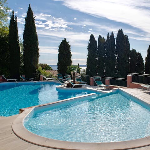 Splash about in the shared rooftop pool and admire the view