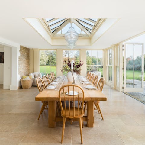 Sit down to a celebratory feast at the solid oak table in the garden room