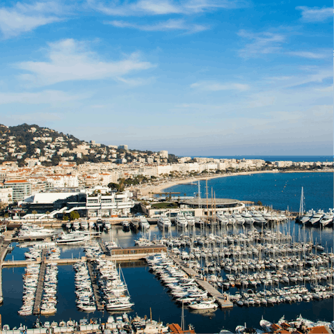 Step outside and take a stroll by the port in Cannes