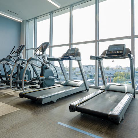 Work up a sweat in the communal gym before diving into the pool
