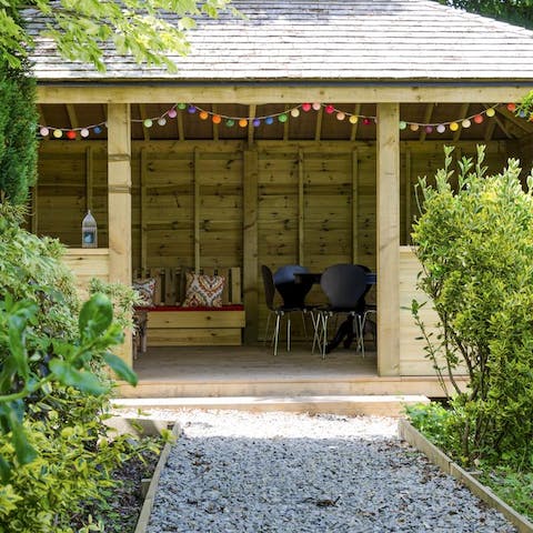Seek some shade on sunny afternoons in the charming summer house