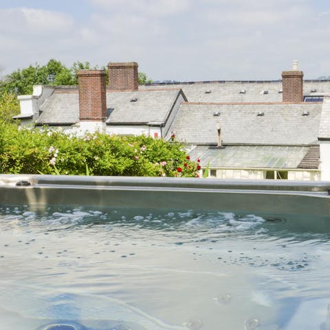 Feel a sense of calm in the bubbling waters of the hot tub