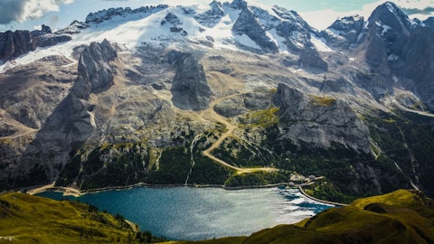 Marvel at Marmolada, the Queen of the Dolomites and its legendary glacier, a fifty-five-minute drive