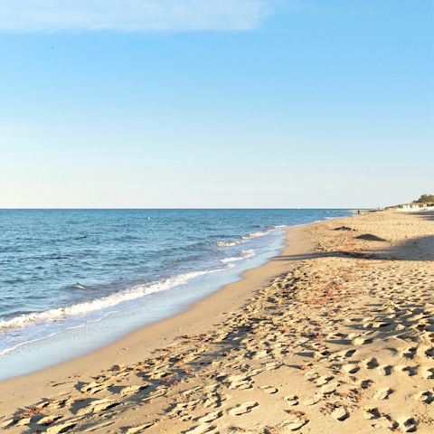 Sink your toes into the sand — the coast is just a short drive away