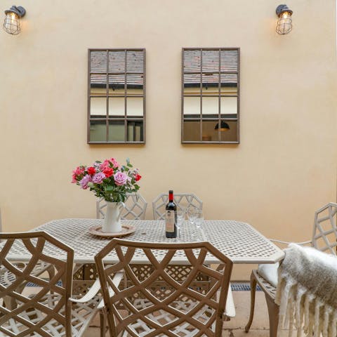 Relax in the courtyard garden with a glass of English sparkling wine