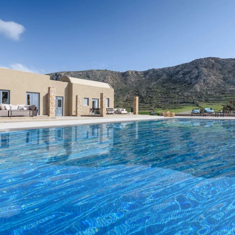 Glide through the silky seawater pool with a postcard-worthy backdrop