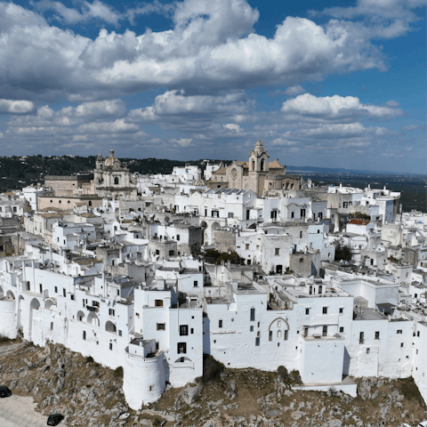 Visit the white-washed town of Ostuni, a twenty-five minute drive away