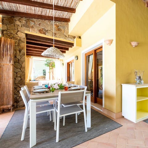 Escape the Sardinian sun and enjoy an alfresco barbecue on the terrace