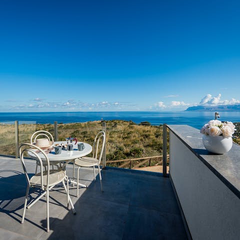 Enjoy your morning coffee on the terrace as you drink in the sea views