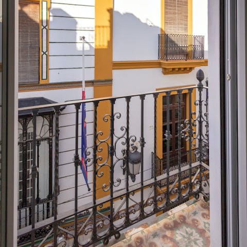 Perch by the Juliet balcony with a coffee ahead of a day of sightseeing