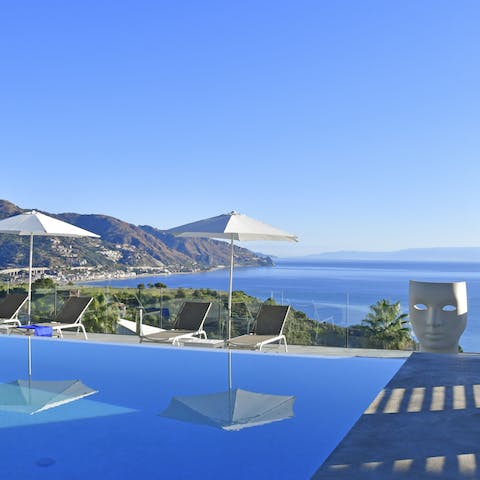 Slip into the swimming pool to cool off from the hot Sicilian sun