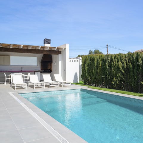 Enjoy total relaxation while lounging by the private pool