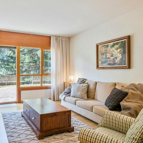 Curl up on the comfy sofa or relax on the terrace with a glass of wine