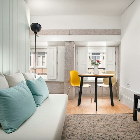 Relax and unwind with a glass of port in the colourful living space