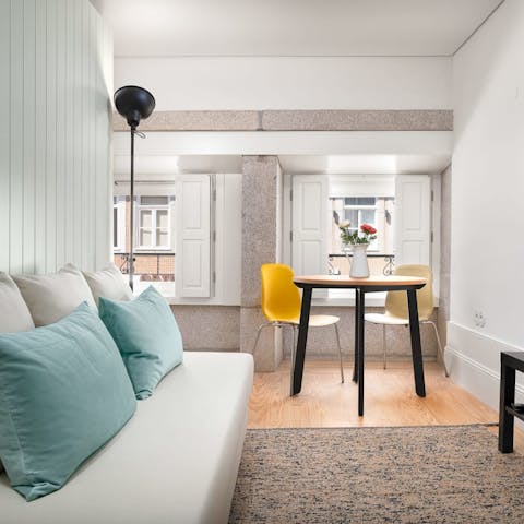 Relax and unwind with a glass of port in the colourful living space