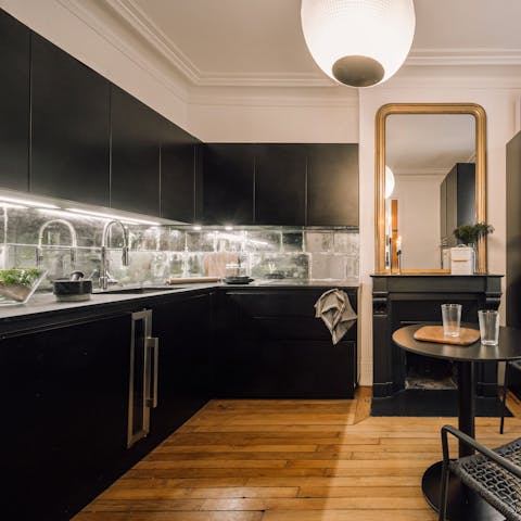 Prepare pastries and coffee for breakfast in the sleek kitchen