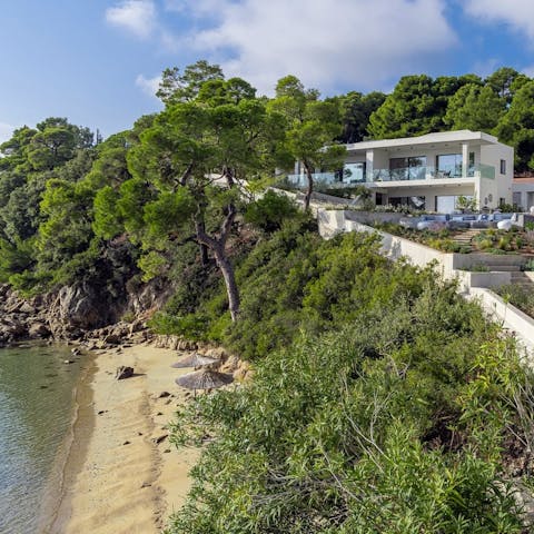 Wander down to the private beach for a dip in the sea