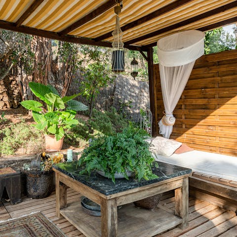 Relax with a good book on the covered deck