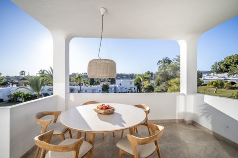 Snack on something tasty as you unwind on the balcony