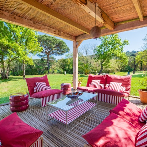Watch the sun set from the Balinese-style lounge