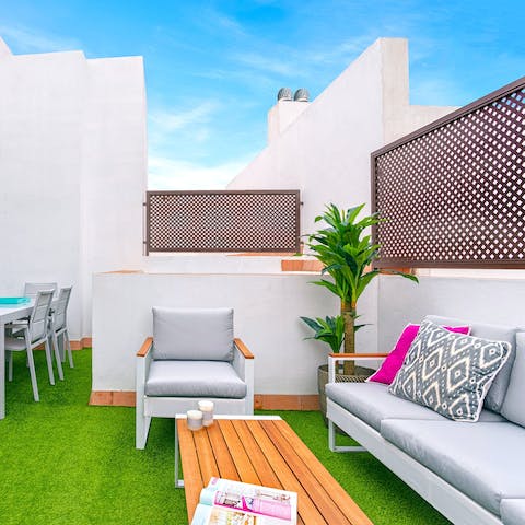 Pour yourself a glass of something refreshing and relax on the terrace