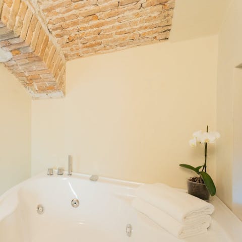 Take an indulgent soak in the private Jacuzzi
