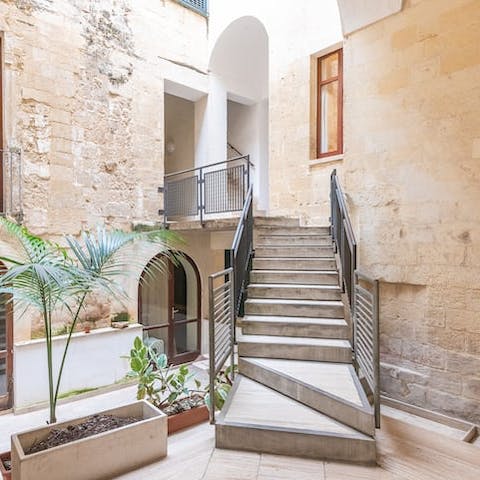 Feel the history of the building in the quiet courtyard