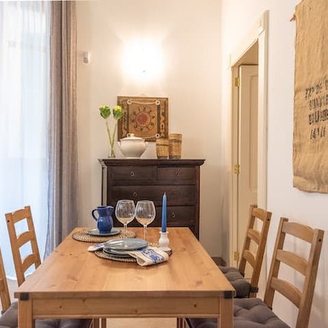 End the day with a glass of Puglian Primitivo at the wooden dining table