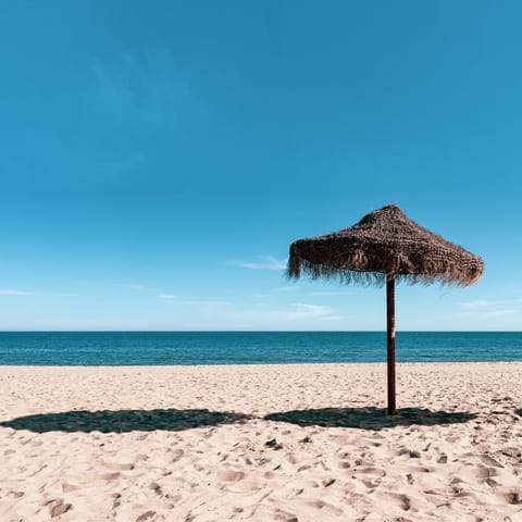 Pack your beach bag and drive down to Stoupa Beach for the day