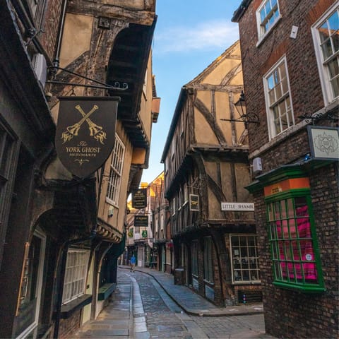 Stroll through the medieval street of The Shambles, a twelve-minute walk away