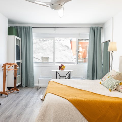 Stay in a sunny studio with pops of yellow brightening things up