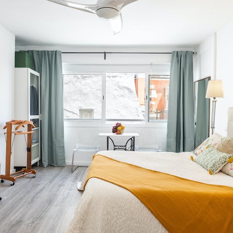 Stay in a sunny studio with pops of yellow brightening things up