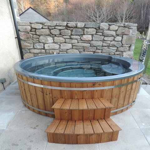 Unwind in the hot tub after a day of hiking