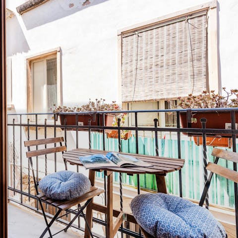 Relax on the balcony with a glass of Prosecco